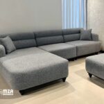 A simple, practical, and comfortable corner sofa + a free pouf.