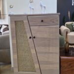 Shoe cabinet made of natural wood.
